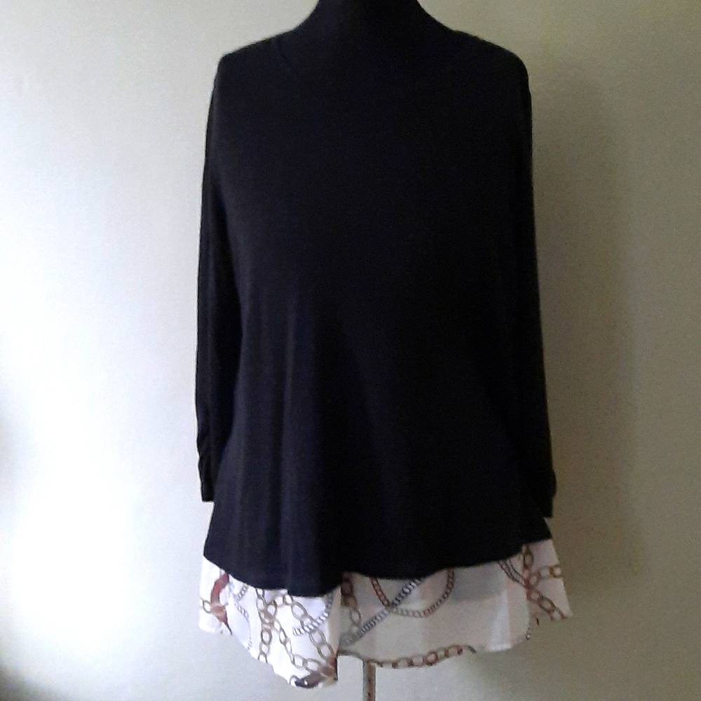Black sweater with blouse layer at bottom